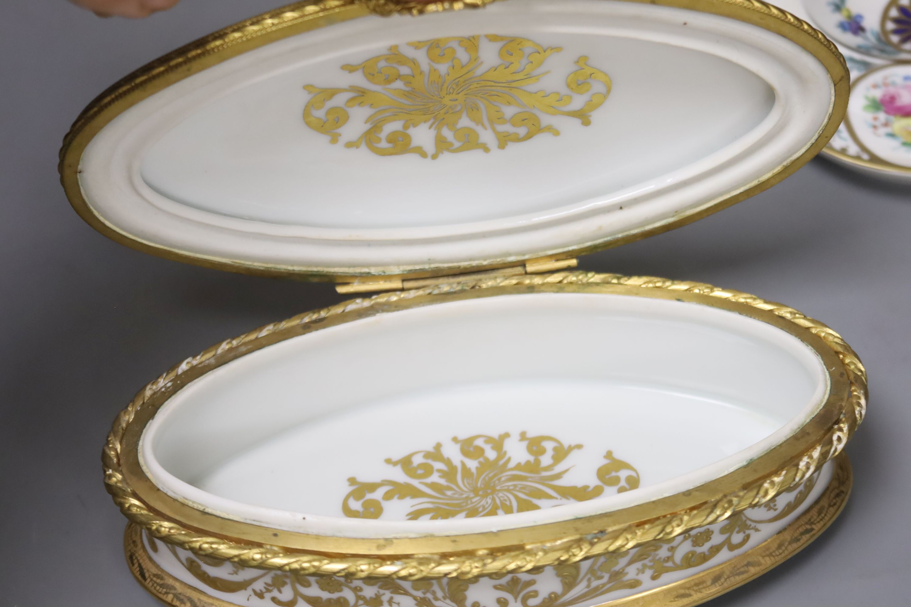 A Paris porcelain box and cover, c.1890, a pair Paris porcelain vases, a similar ‘fantastic birds’ bowl and a Dresden inkwell and height 25cm